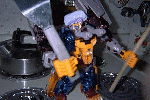 Chef Optimus whacks me over the head with the spatula.